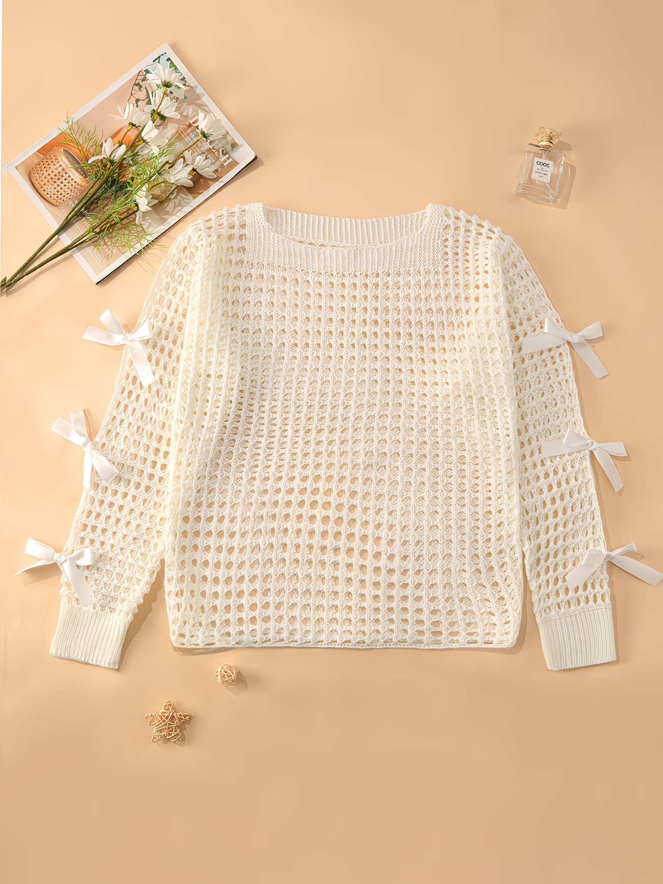 Hollow-Out Cover-Up Sweater with Bow Detail