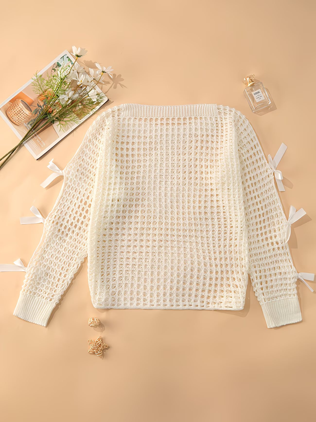 Hollow-Out Cover-Up Sweater with Bow Detail
