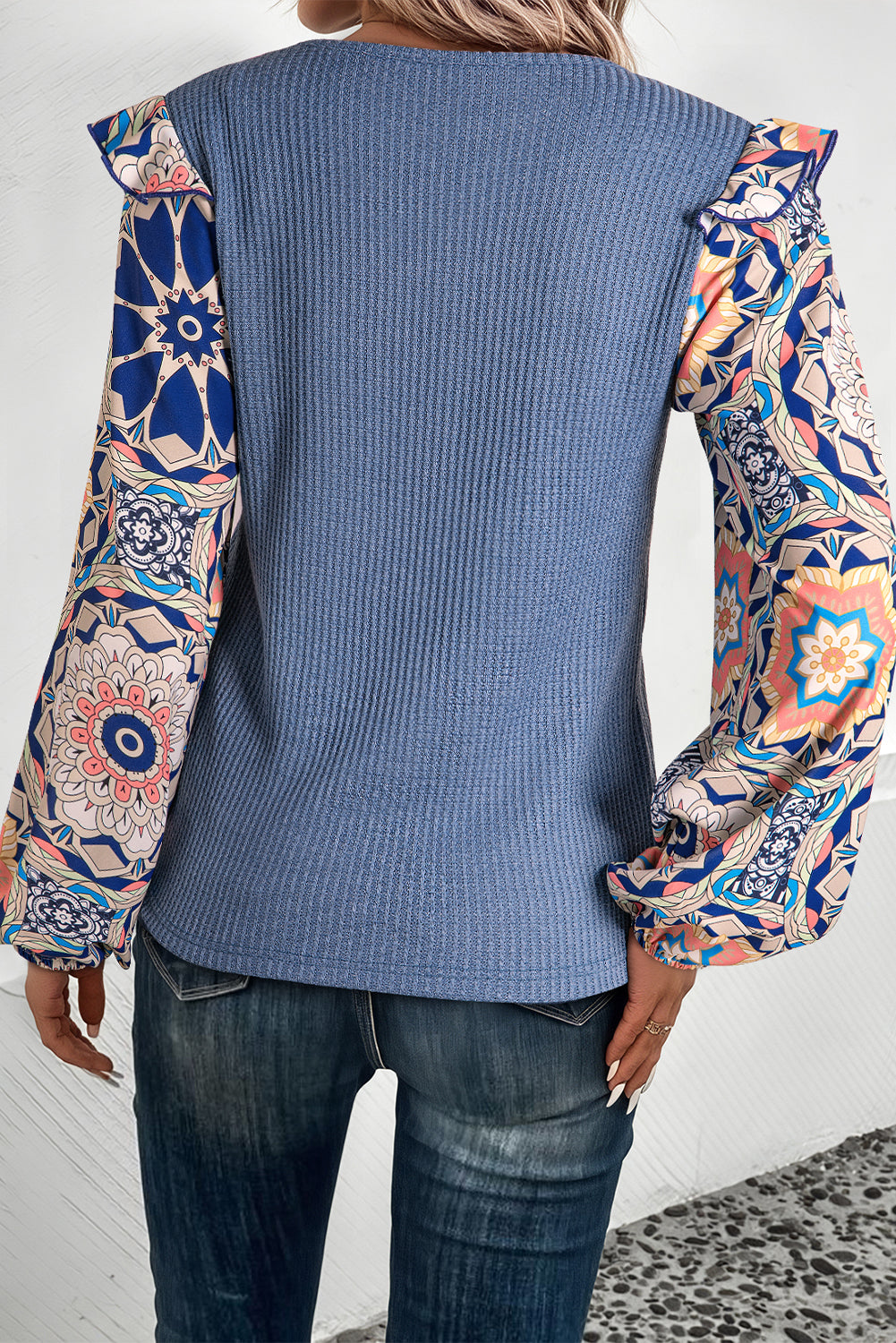 Blue O-Neck Waffle Knit Blouse with Floral Sleeves and Ruffles